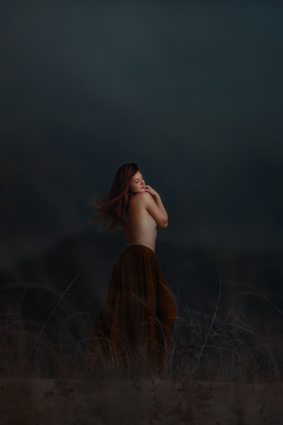 Ensaio de nu artístico nas dunas da joaquina em florianopolis