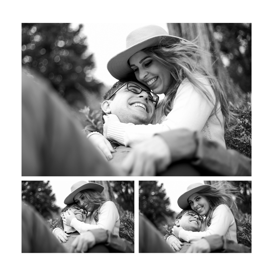 Casal se abraçando e sorrindo.