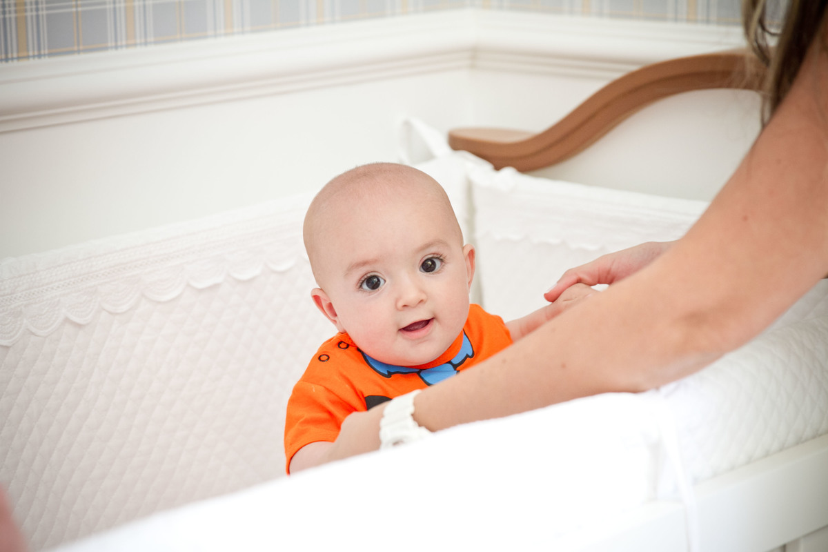 Fotografia de bebê no berço