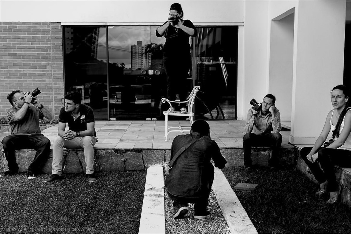 fotografos fotografando durante o curso de robison kunz