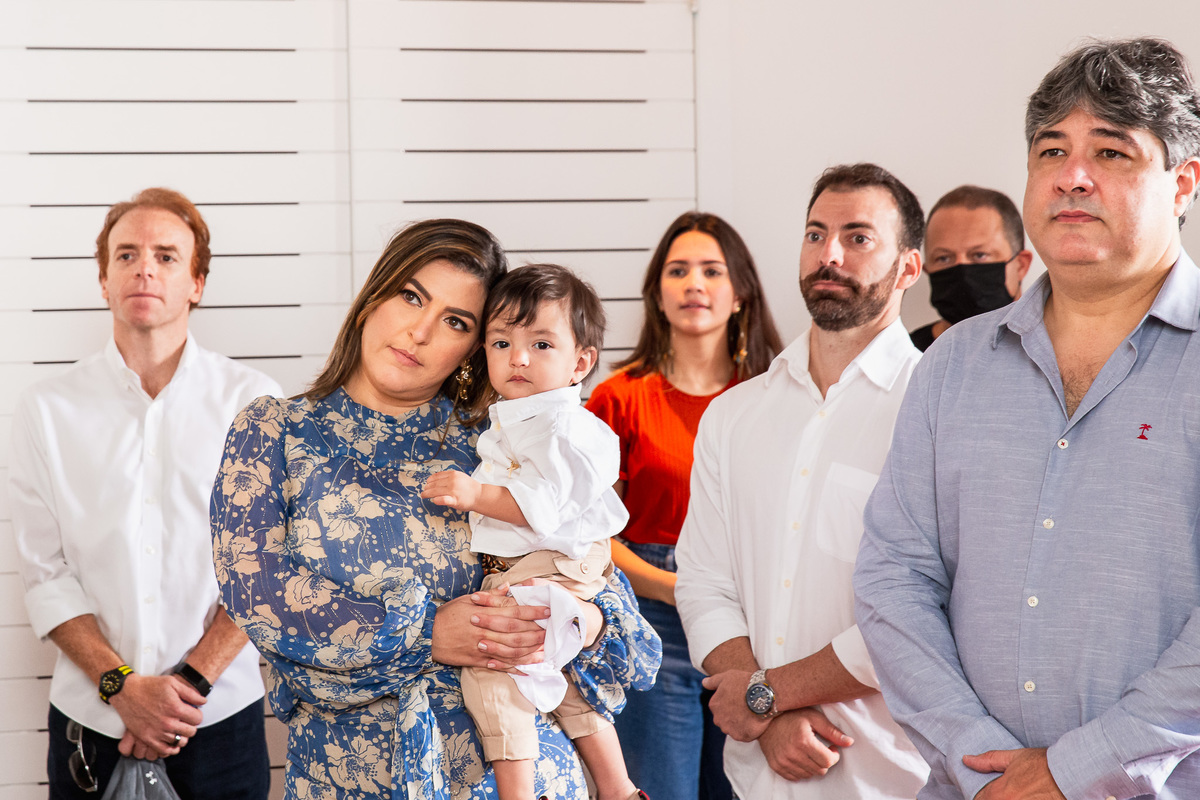 familia participando do batismo