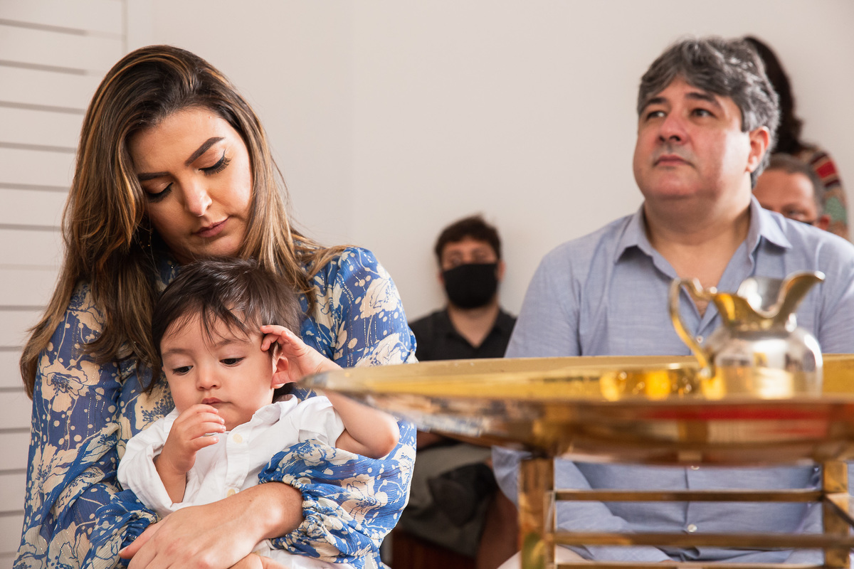 familia participando do batismo