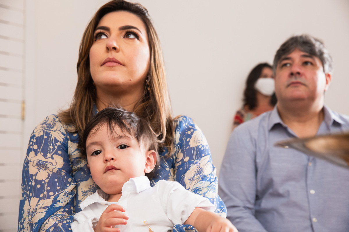 familia participando do batismo