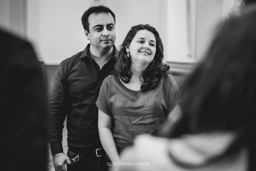 casal de pais no batismo