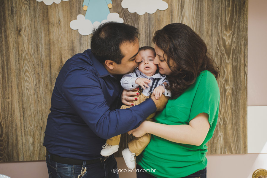 fotografia dos pais na festinha batismo
