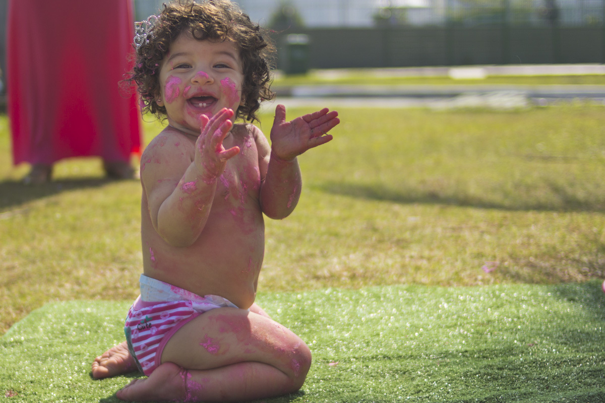 fotografo-em-santos-emissario-criança-sorrindo