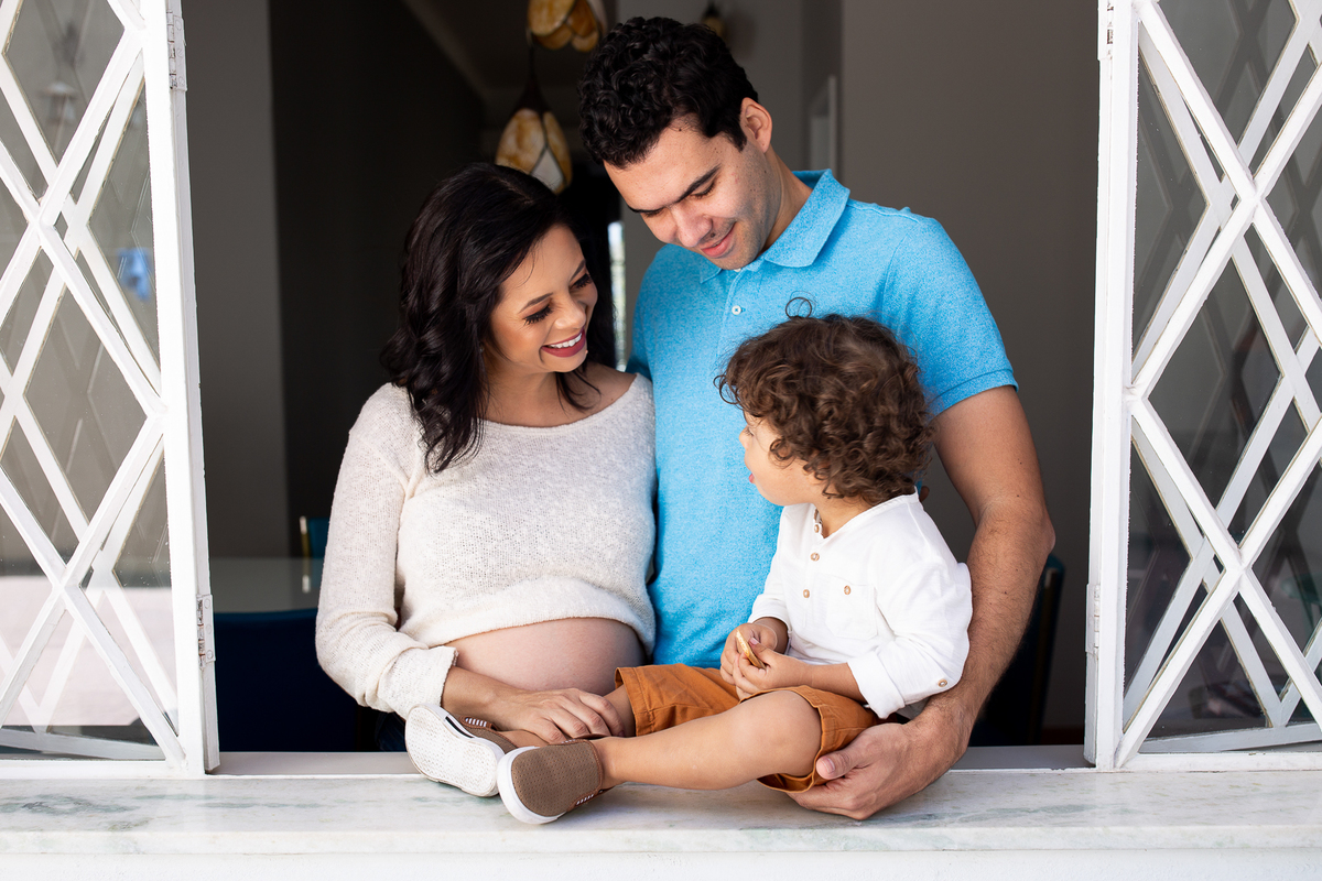 fotografia de gestante com a família da fotógrafa liliany bibiano 