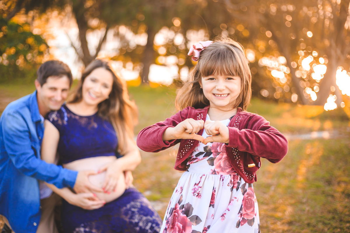 filha fazendo coração