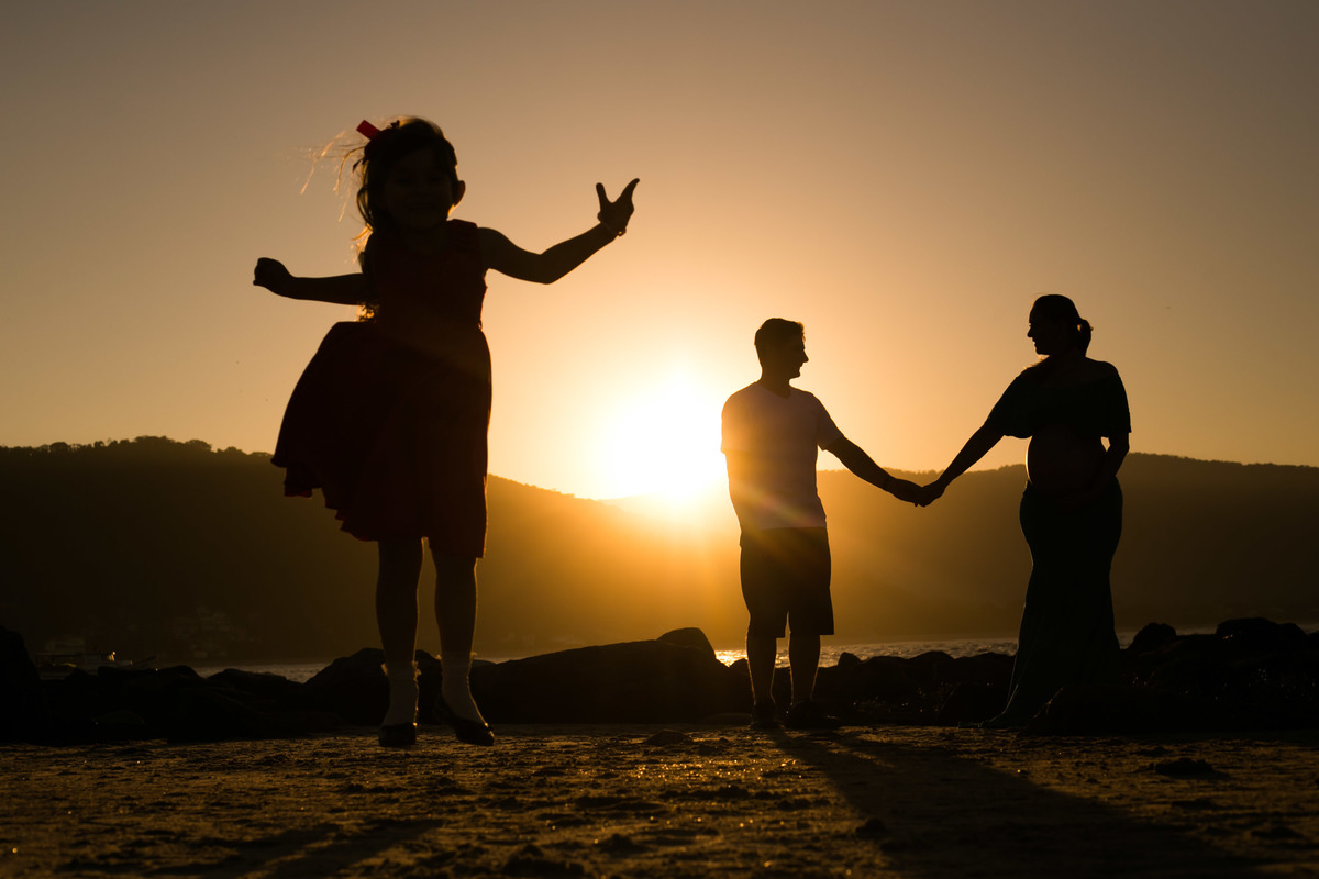 fotos de familia na praia da armação floripa