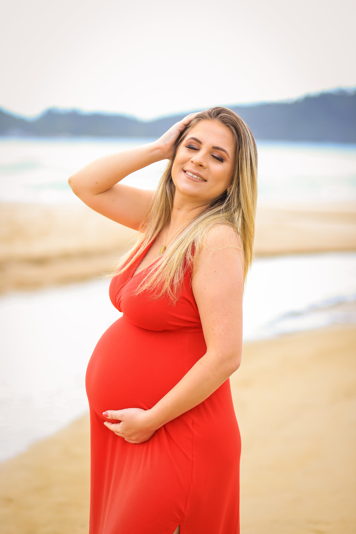 Gestante na praia do campeche, floripa