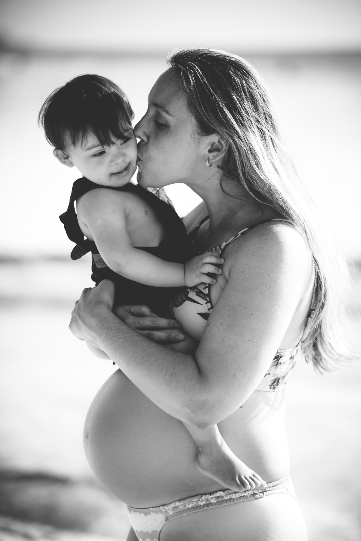 mae beijando o filho, sindrome de down