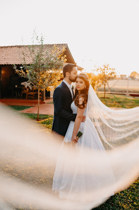 casamento por marcus espindola fotografia ano 2022 momentos da cerimonia de casamento ao ar livre e ensaio dos recem casados ao por do sol na campestre clube gaucho