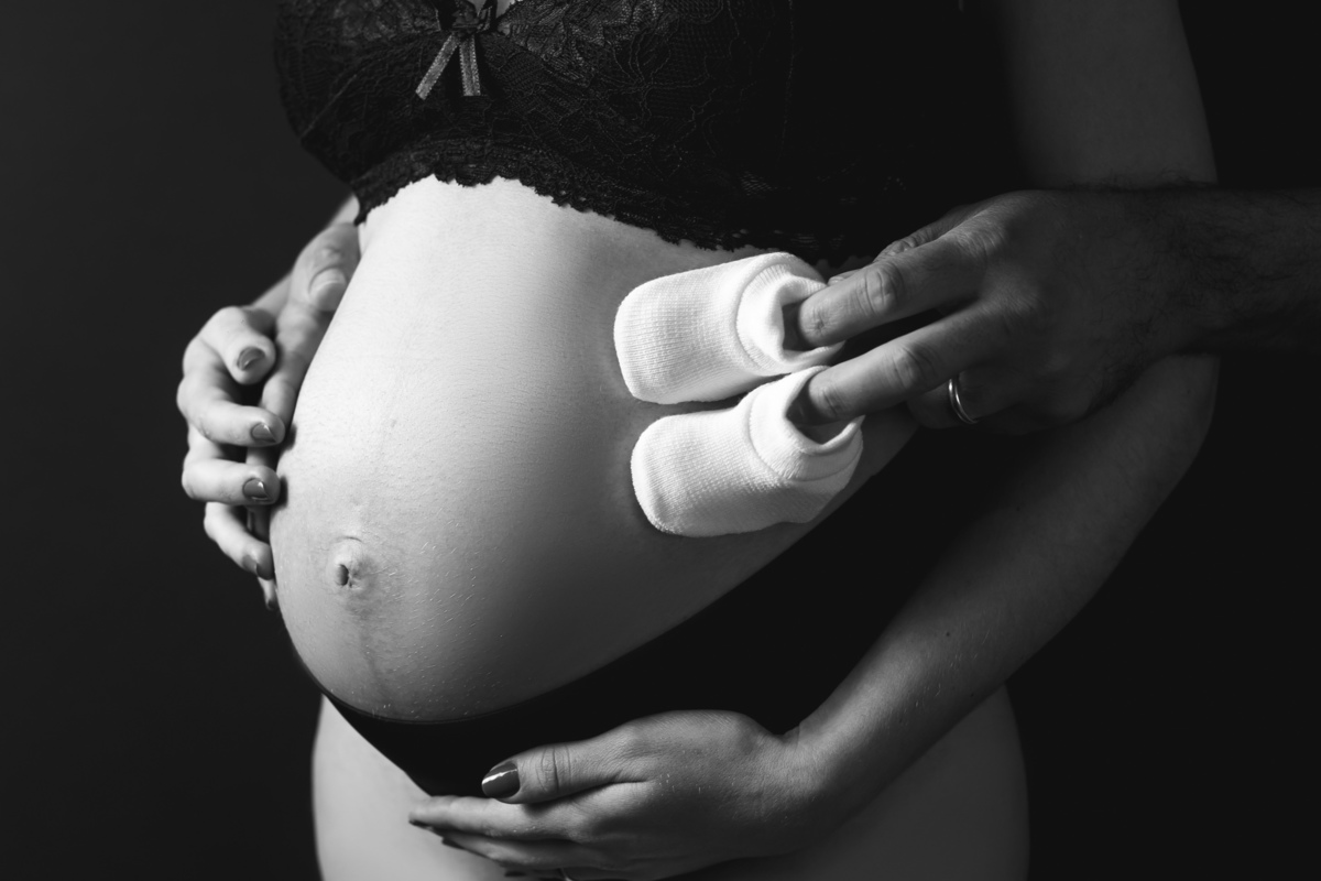 Suellen Oliveira.
foto com sapatinho na barriga.