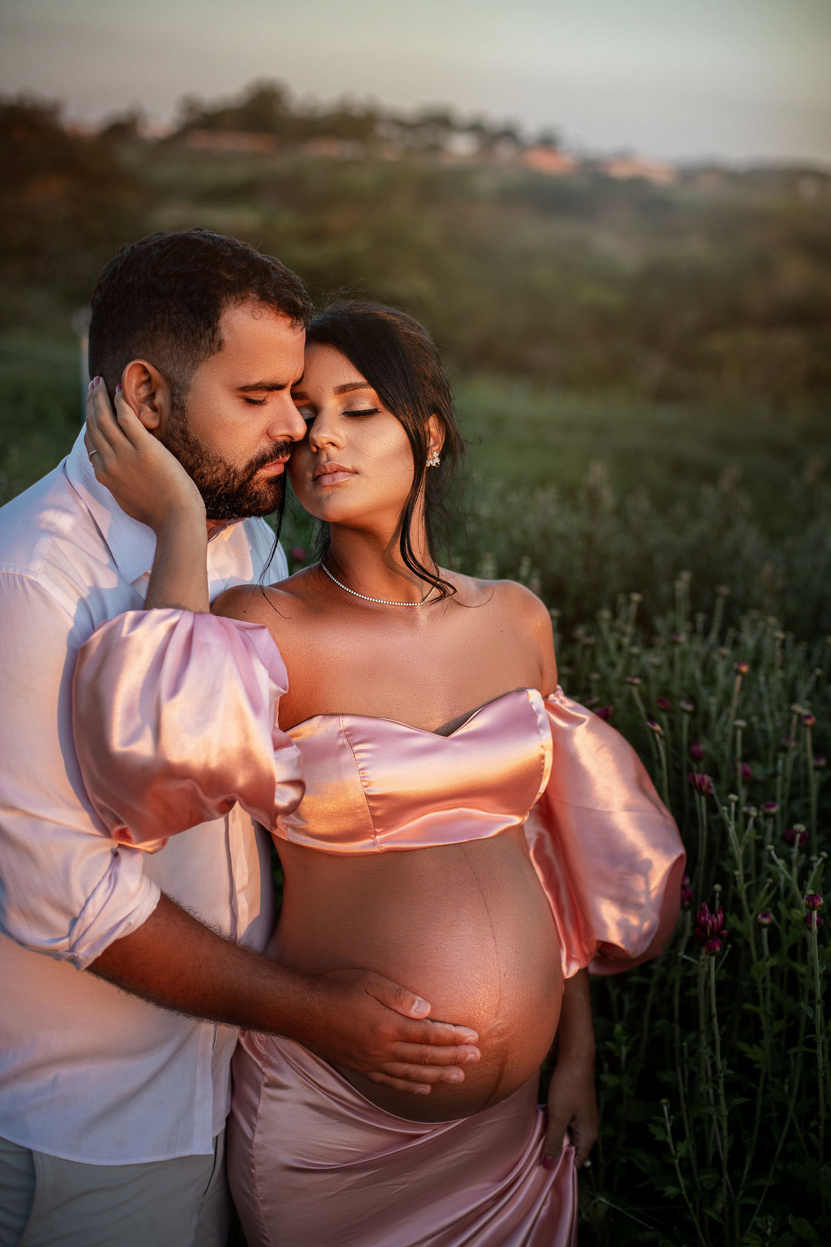 a espera do bebe com o por do sol 