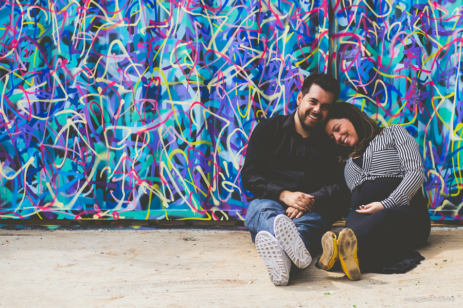 Fotografia de pais sentados no Beco do Batman