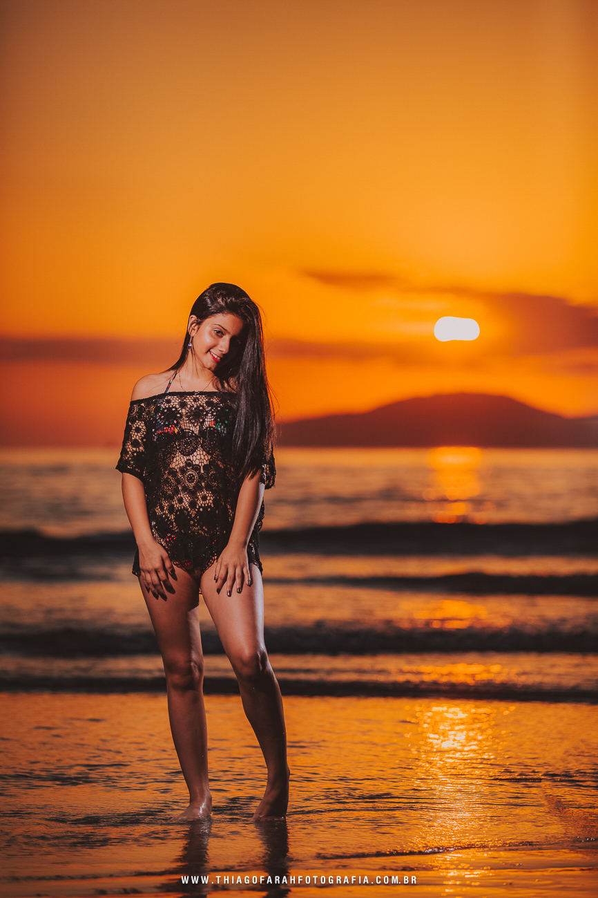 ensaio externo 15 anos, ensaio em santos, muretas de santos, por do sol, mar azul, golden hour