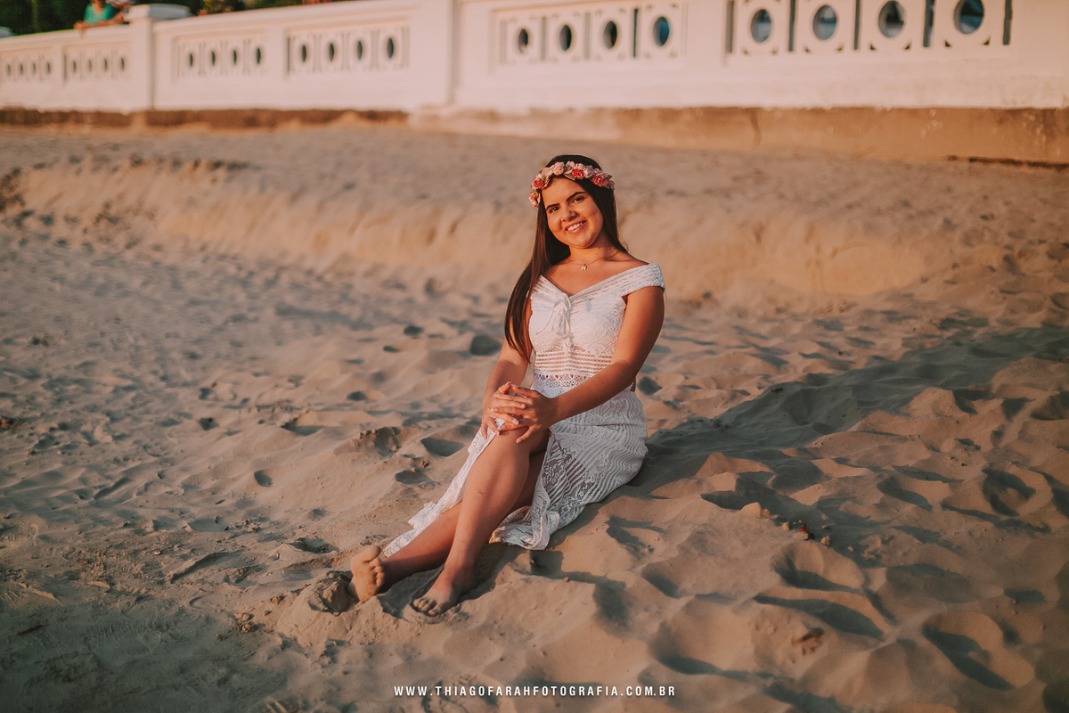 ensaio externo 15 anos em santos, ponta da praia, por do sol, muretas de santos, areia, golden hour