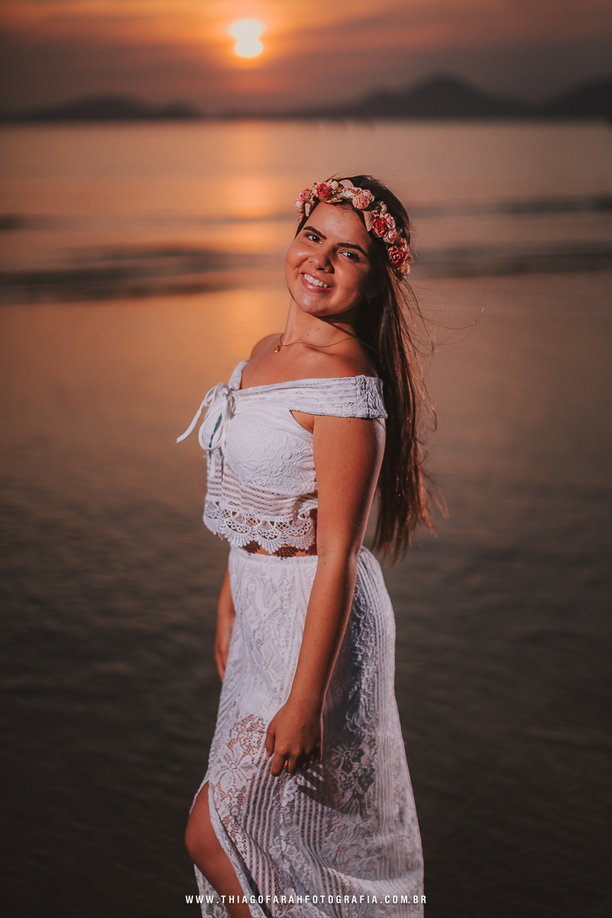 ensaio externo 15 anos em santos, praia, mar por do sol