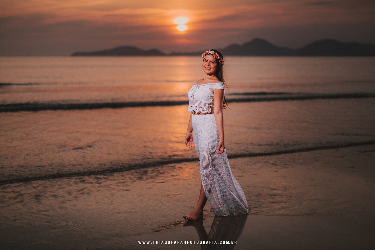 ensaio externo 15 anos em santos, praia, mar por do sol