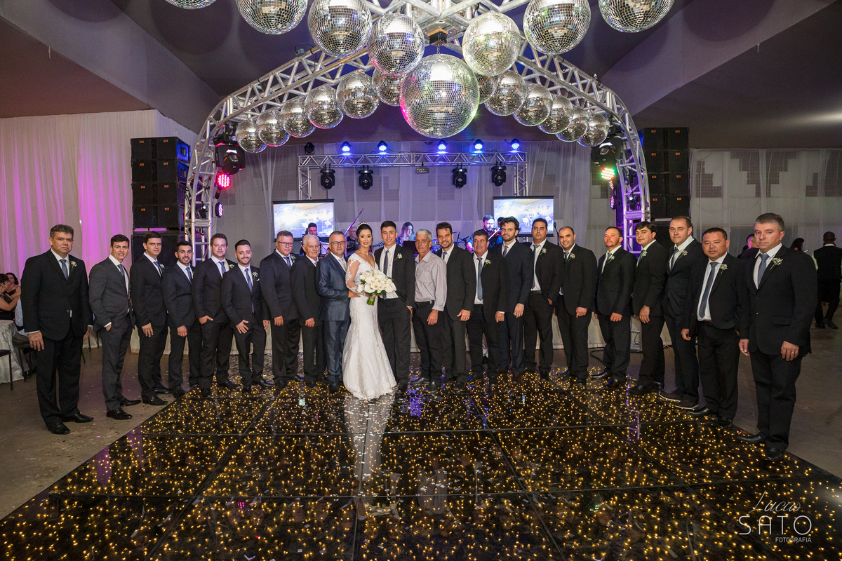 Foto dos padrinhos na recepção do casamento em Rio Paranaíba