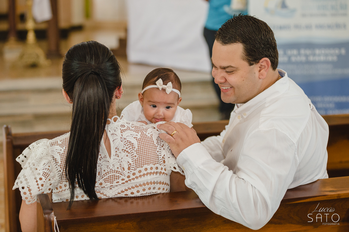 Fotografia espontânea durante o batismo na Igreja Matriz em São Gotardo