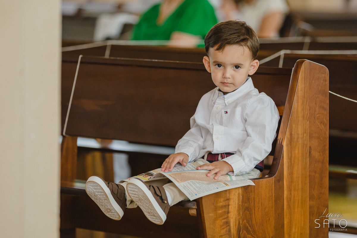 Fotografia do irmão da batizada