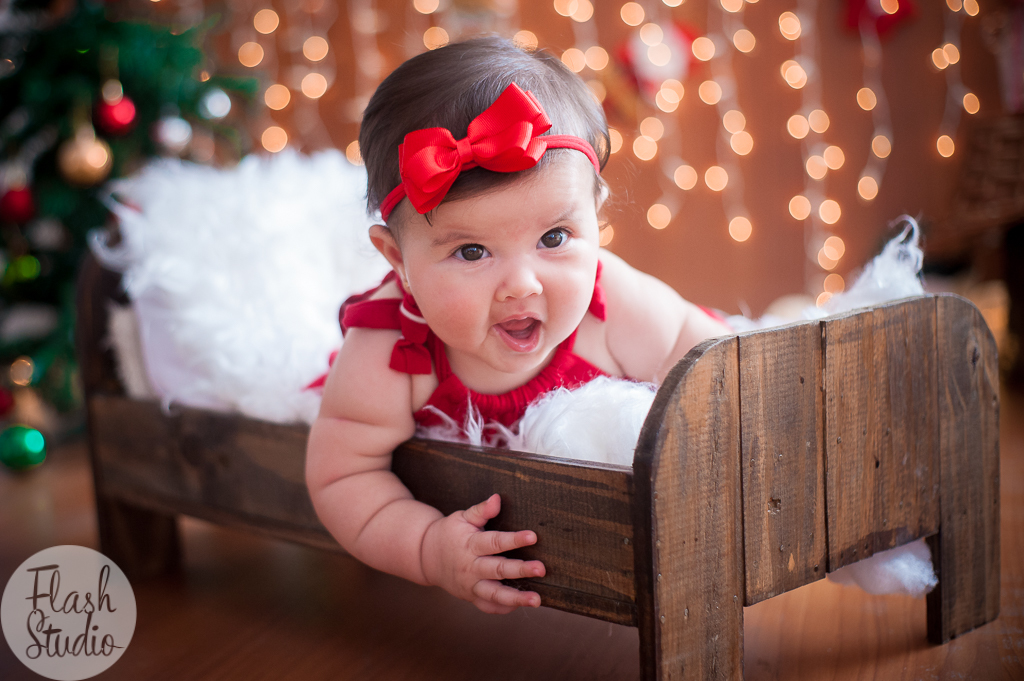 bebe gatinha sorrindo em ensaio de natal, no rio de janeiro 
