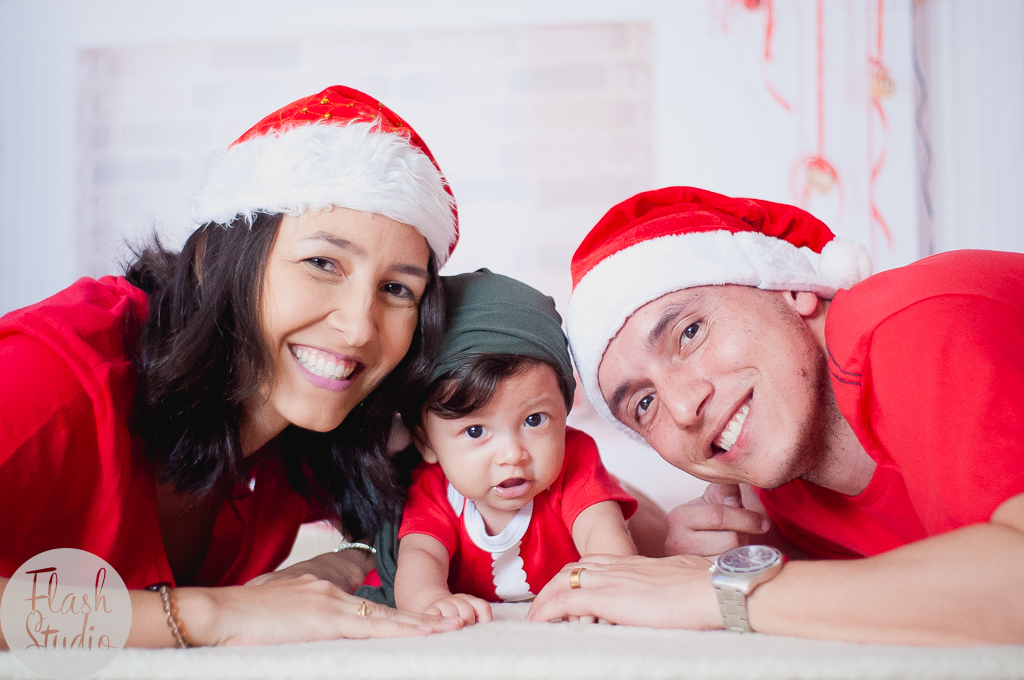 familia sorrindo em ensaio fotografico de natal no rio de janeiro