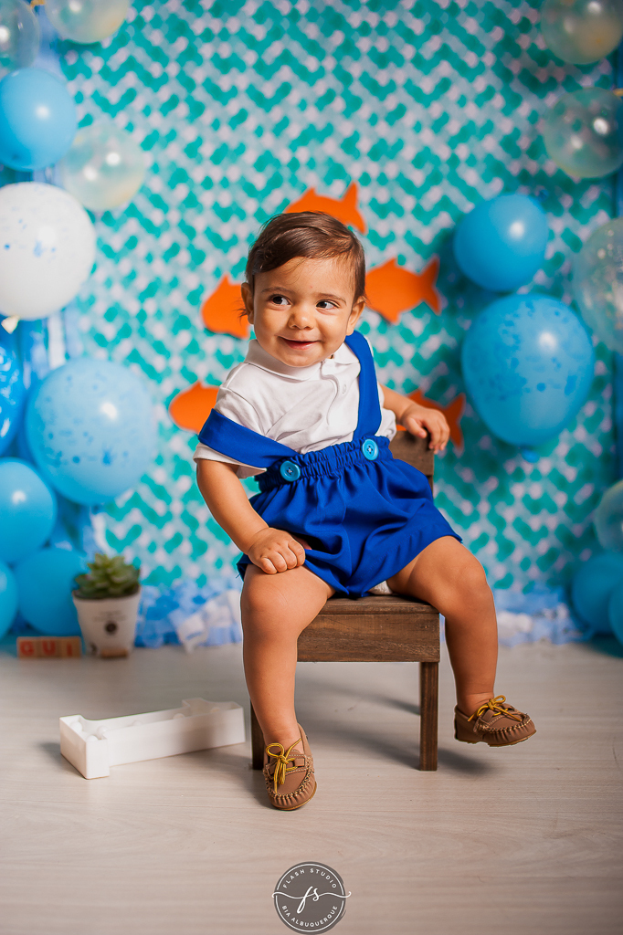 Smash the cake fundo do mar - bangu - rio de janeiro cenario fundo do mar - bebe sentado sorrindo