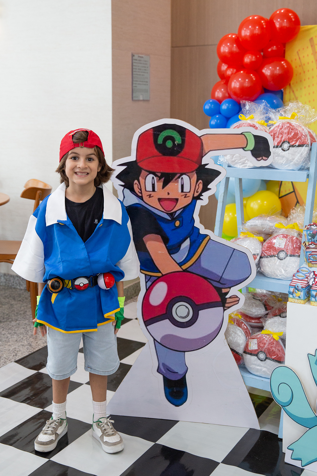 aniversario-pokemon-vilavelha-2025-joao-sorrindo