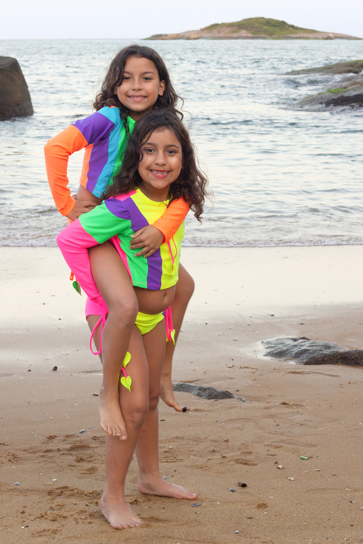 ensaio-irmas-familia-praia-vitoria-es-2026