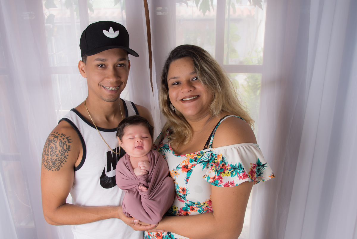 Quando o bebê sorrir para a foto em seu ensaio newborn 