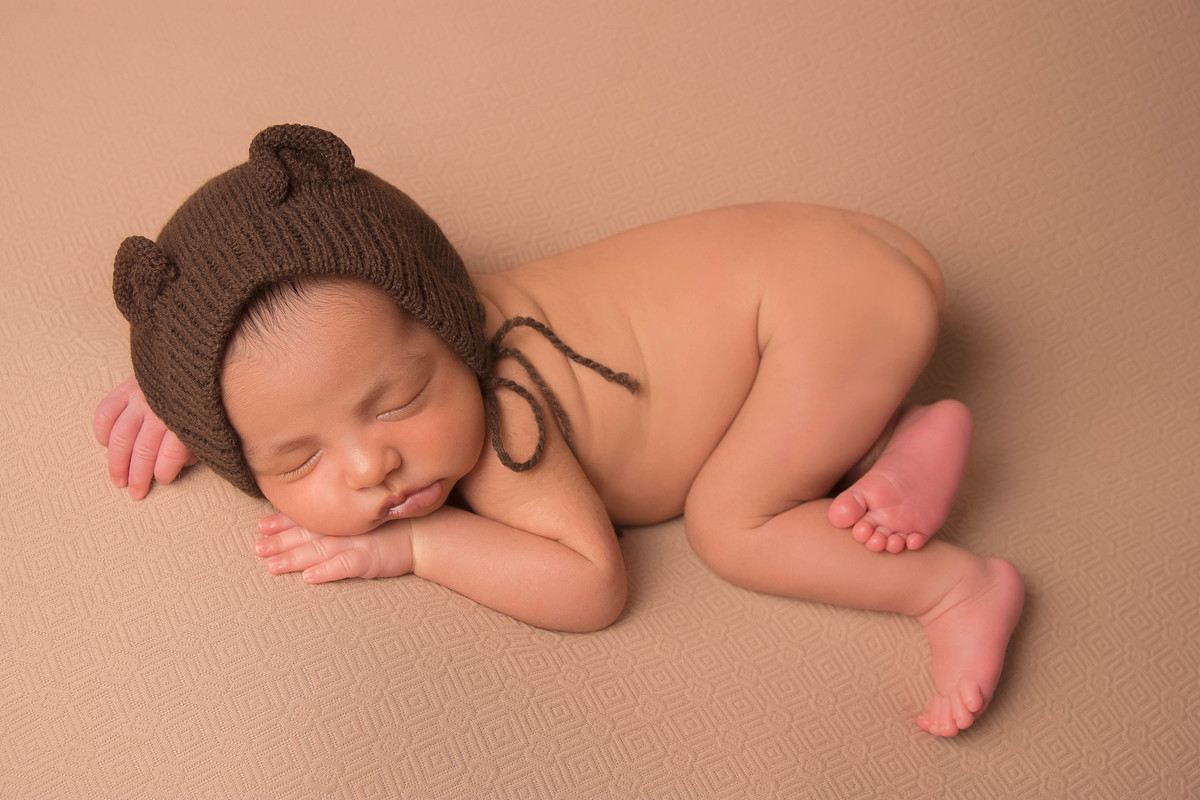 O ensaio newborn conta a história do seu filho.