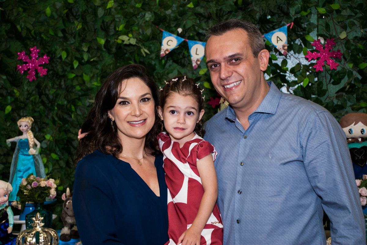 fotografia de Clara com os pais