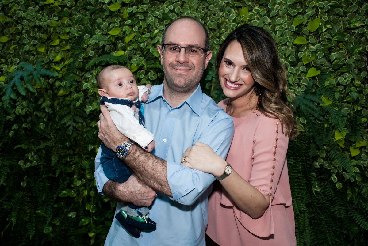 fotografia do bebê com os pais