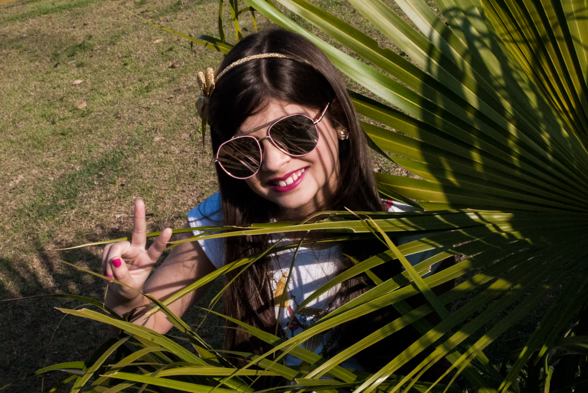 charme com seu óculos de sol