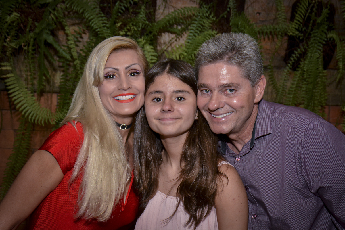 os pais felizes na festa