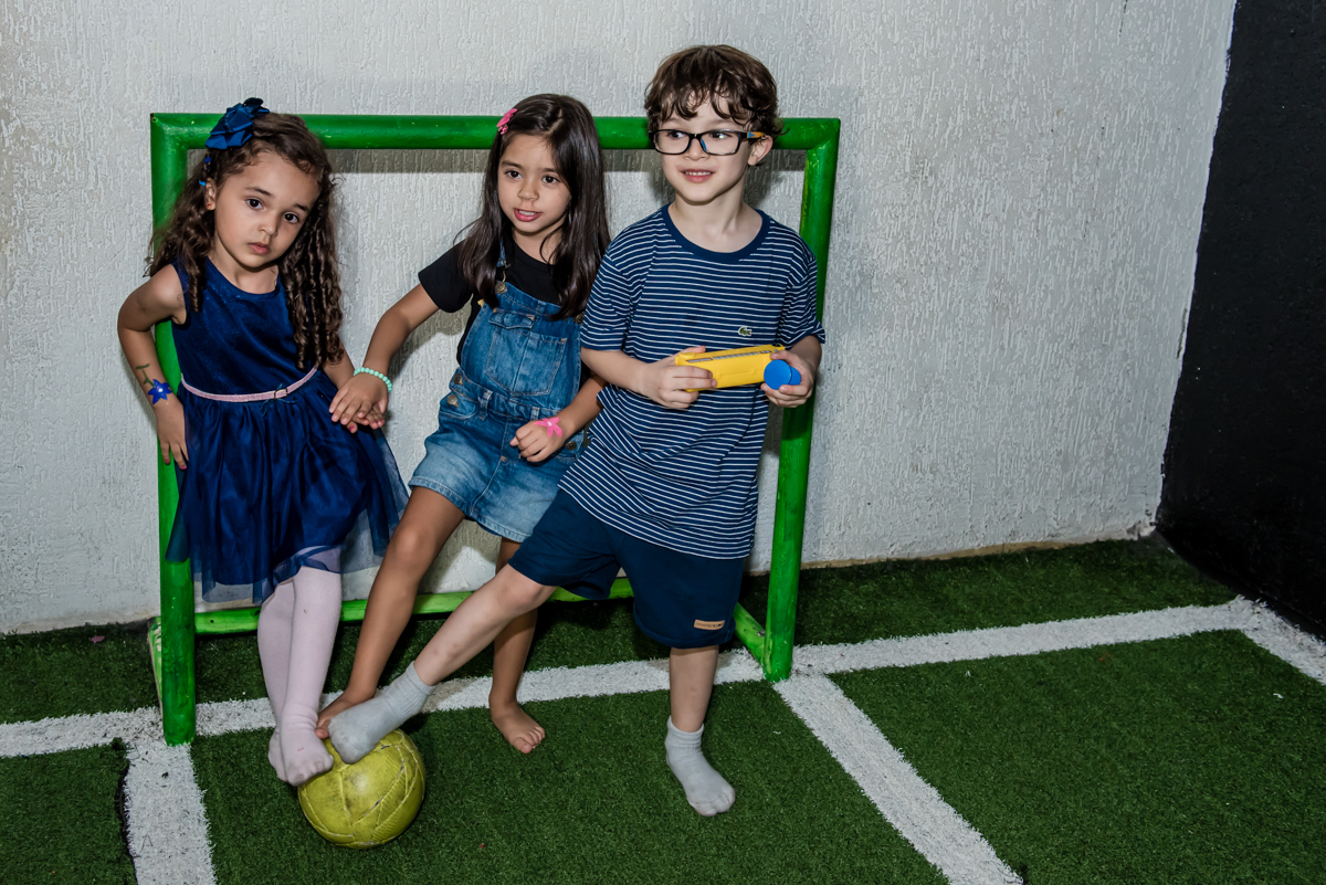 pose de jogador de futebol para a foto