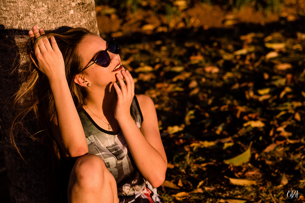 Fotografia ensaio 15 anos ao ar livre fim de tarde