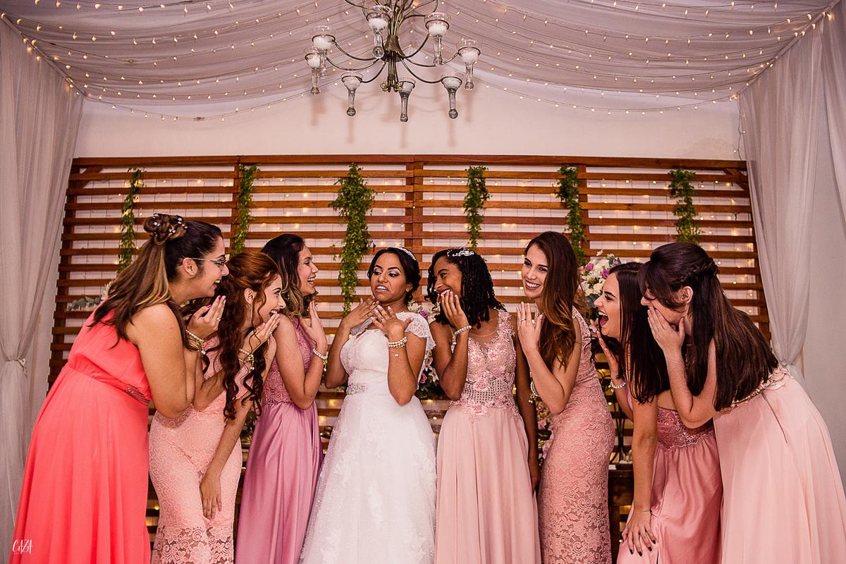 Fotografia de casamento recepção madrinhas vestido
