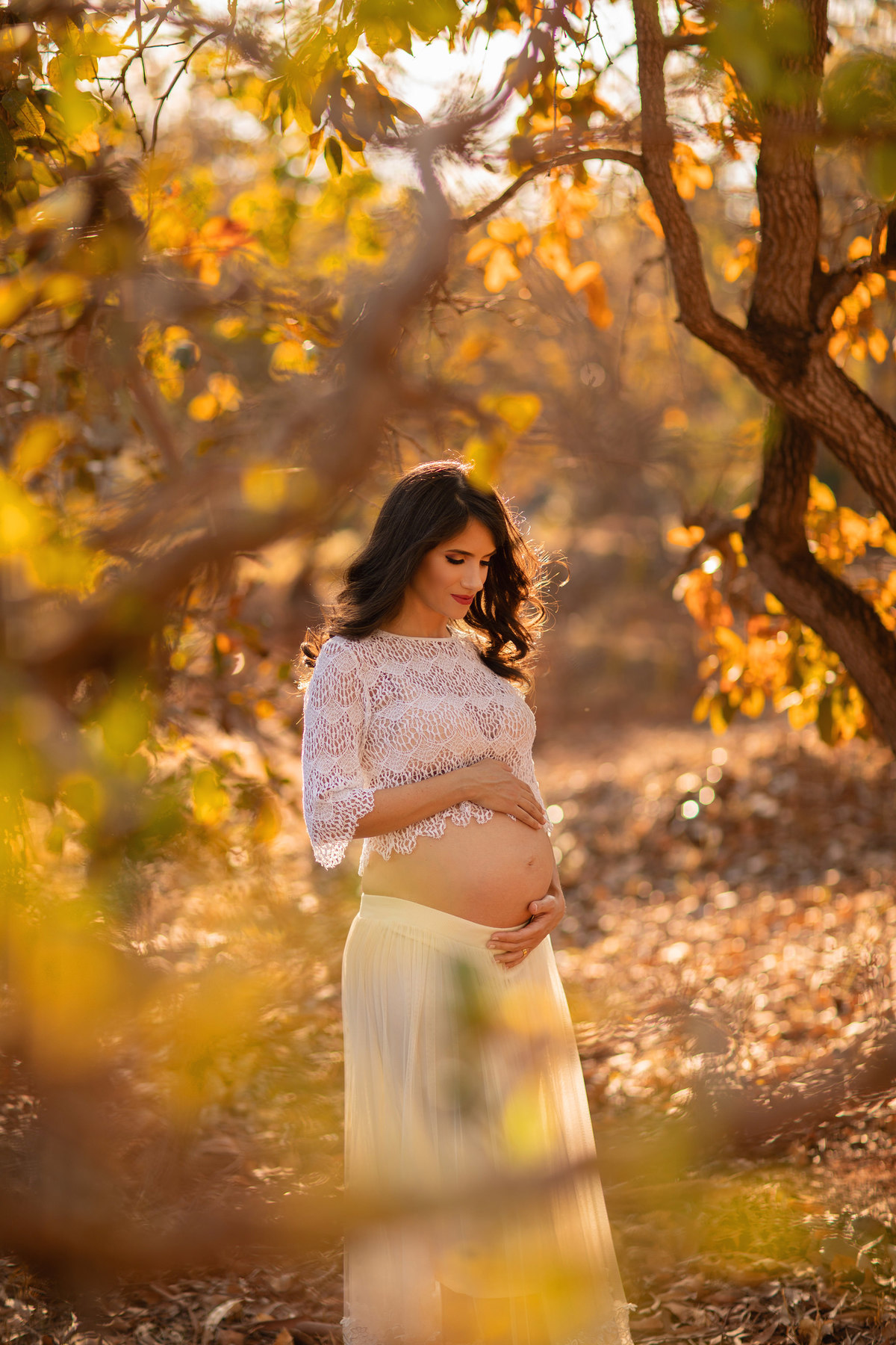 Grávida no cerrado. Foto feita pelo fotógrafo Rafael Ohana no parque Olhos D´água em Brasília-DF.