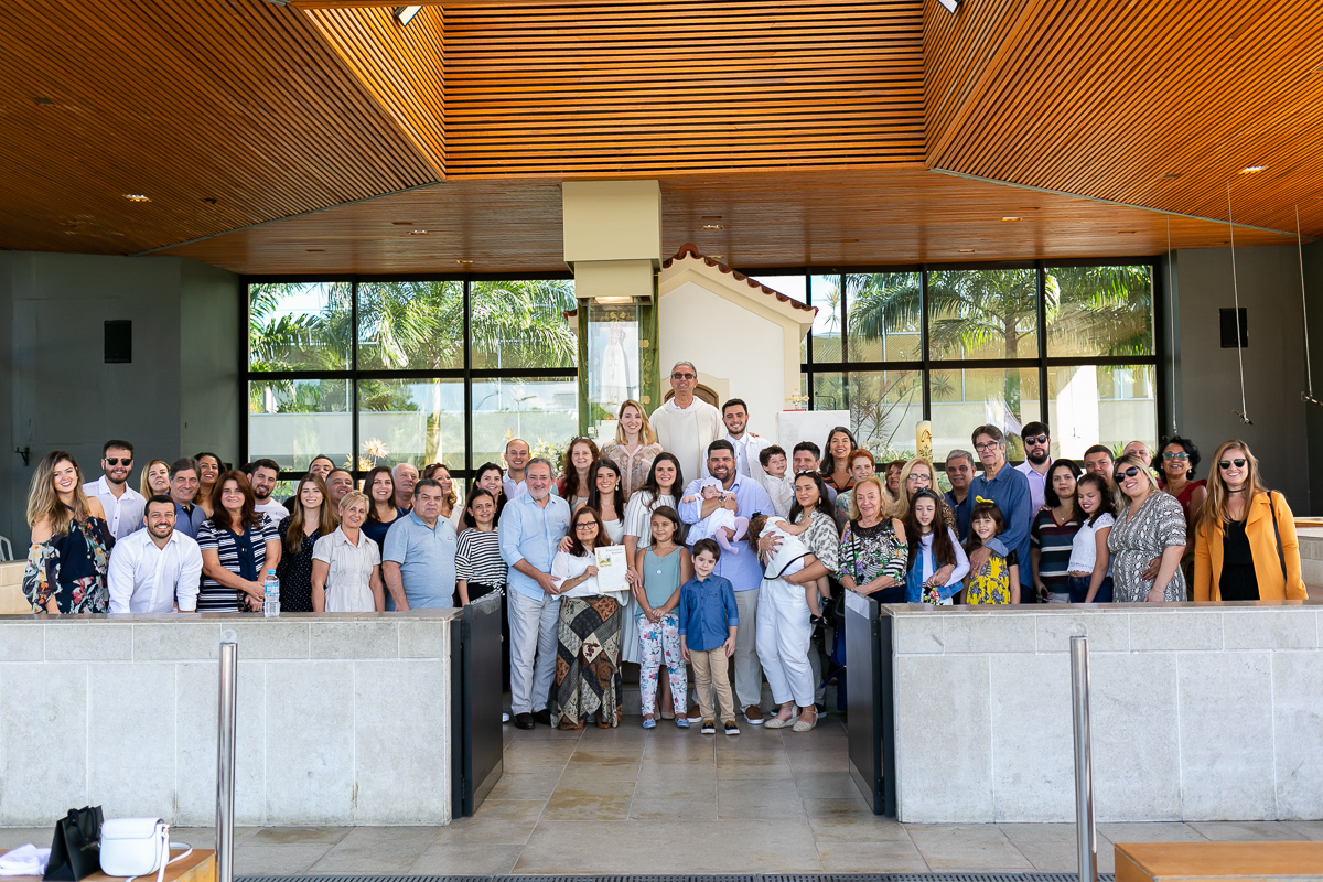 a família toda reunida no batizado da catarina