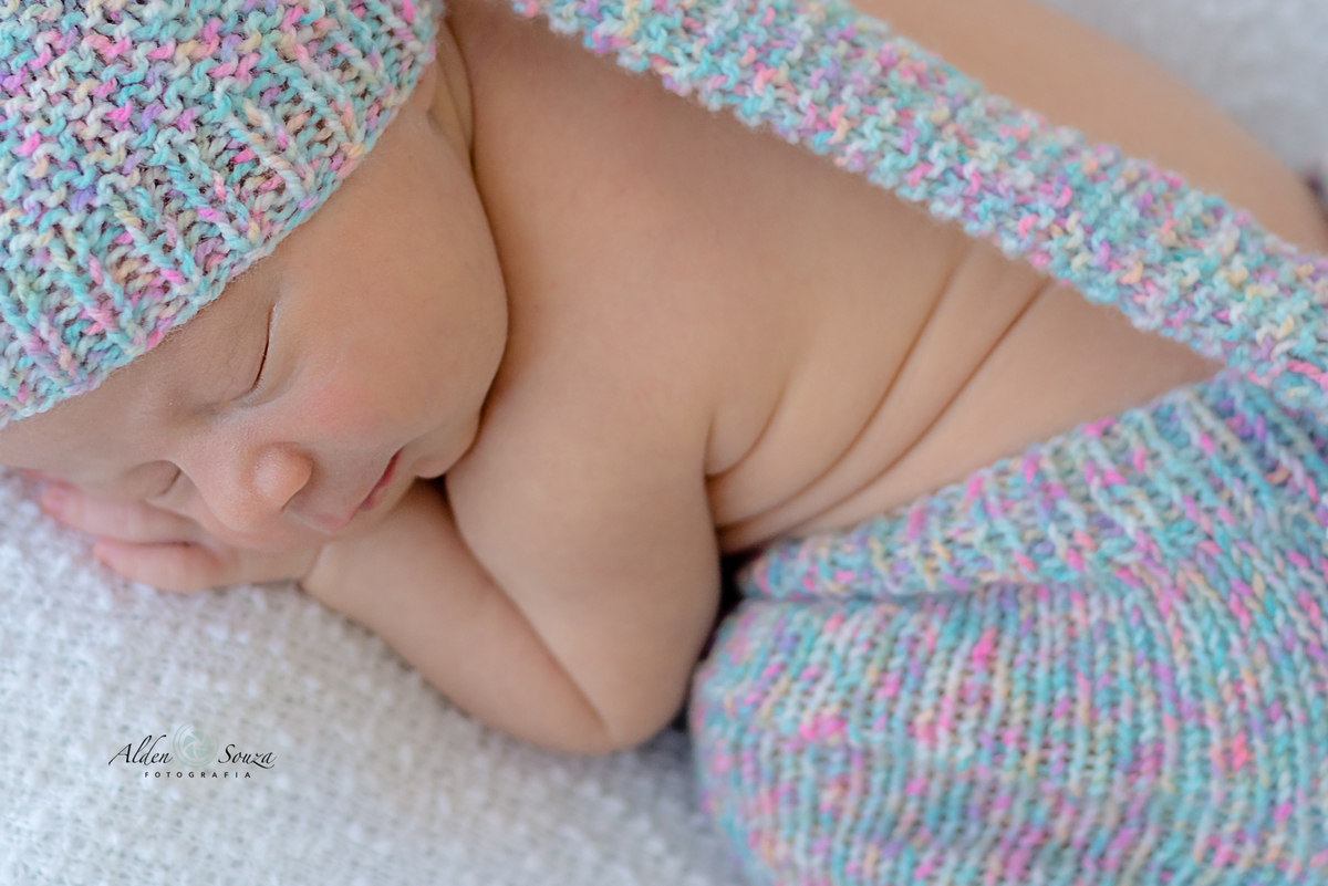 dobrinhas de um bebe newborn