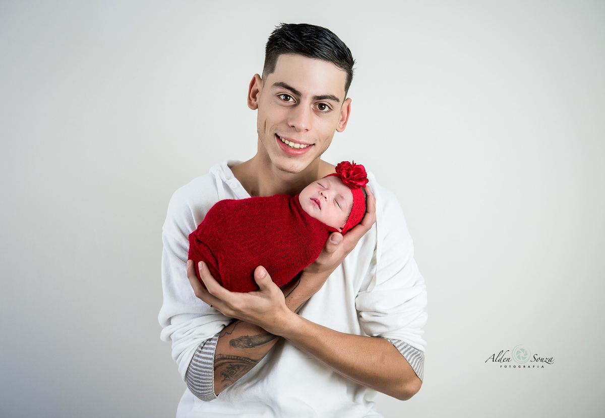 bebe no colo do papai