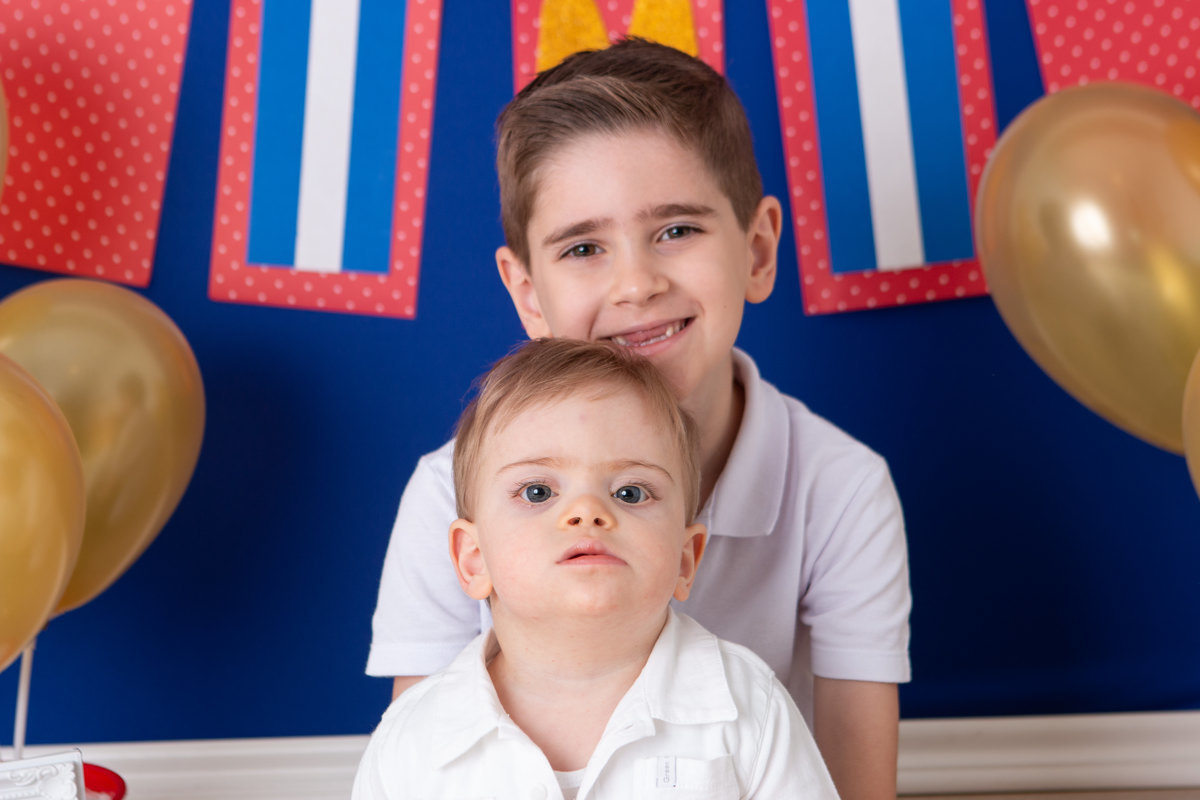 ensaio de criança, ensaio smash the cake, ensaio fotografico smash the cake, fotografia de criança, fotografia com cenário, fotografia de menino, foto de bebê com cenário, soldadinho de chumbo, fotografia de bebê com síndrome de down