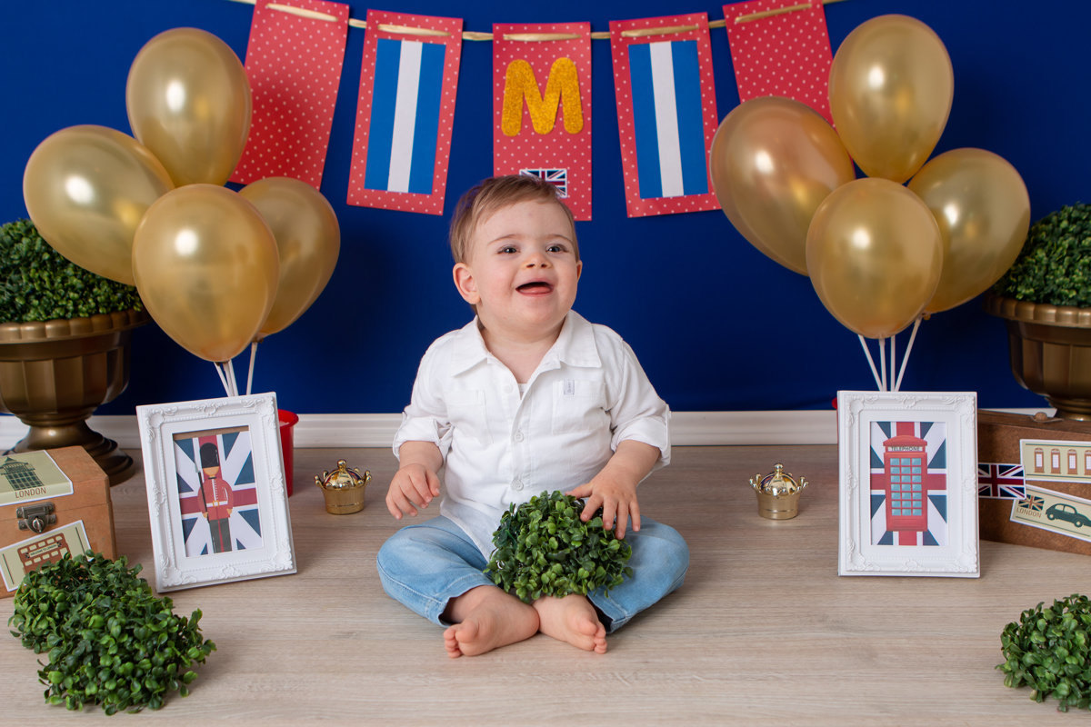 ensaio de criança, ensaio smash the cake, ensaio fotografico smash the cake, fotografia de criança, fotografia com cenário, fotografia de menino, foto de bebê com cenário, soldadinho de chumbo, fotografia de bebê com síndrome de down