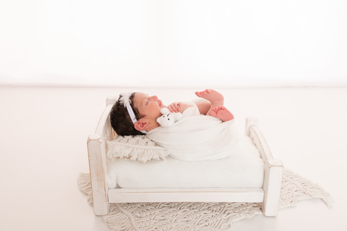 fotografia de recém nascido na caminha