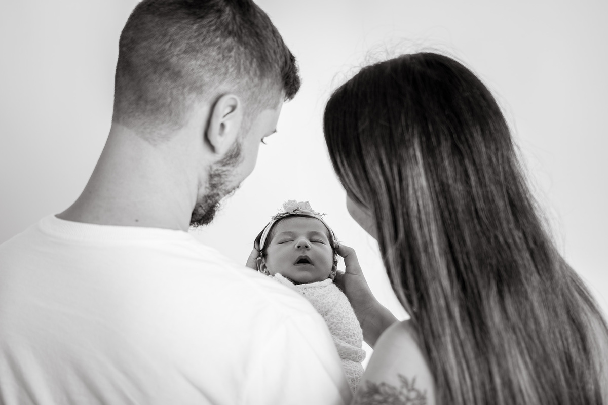 foto recém nascido com os pais