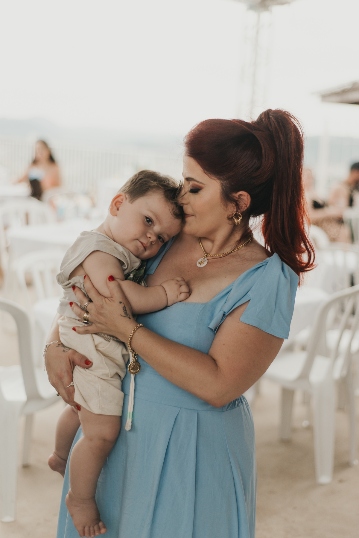 Aniversário infantil, bebê no colo da mãe  em São Roque -SP