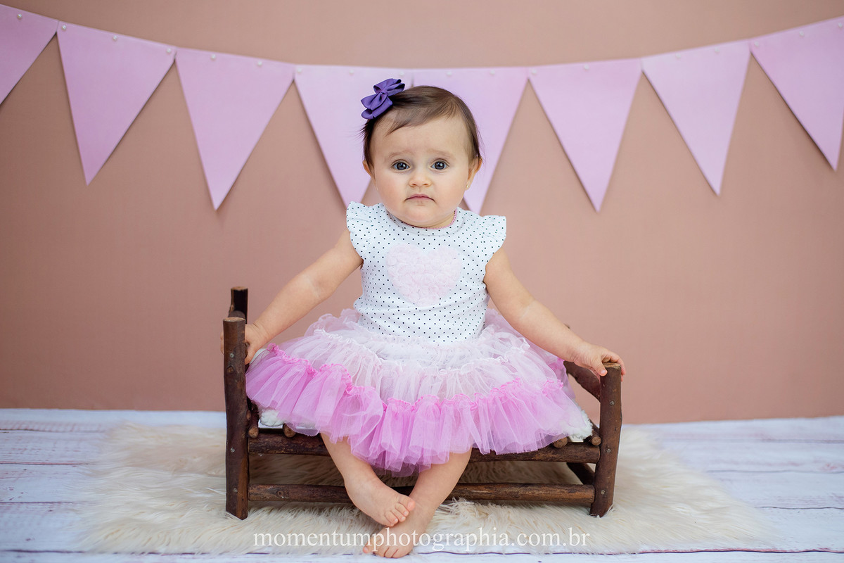 foto tirada por momentum photographia aniversario ensaio infantil em petropolis rj estudio 10 meses